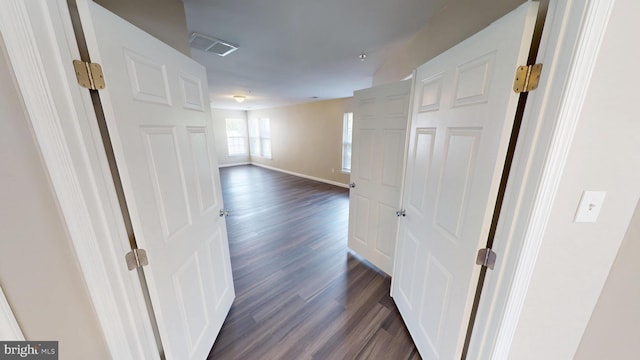 8117 Grayden Ln, Brandywine, MD 20613 - hallway with dark wood-type flooring and baseboards