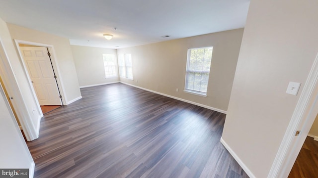 8117 Grayden Ln, Brandywine, MD 20613 - empty room featuring plenty of natural light and dark wood-style floors