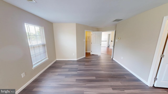 8117 Grayden Ln, Brandywine, MD 20613 - empty room featuring baseboards and dark wood-type flooring