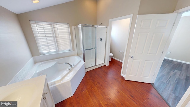 8117 Grayden Ln, Brandywine, MD 20613 - full bath featuring a shower stall, a garden tub, lofted ceiling, wood finished floors, and vanity