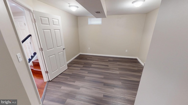 8117 Grayden Ln, Brandywine, MD 20613 - below grade area with wood finished floors and baseboards