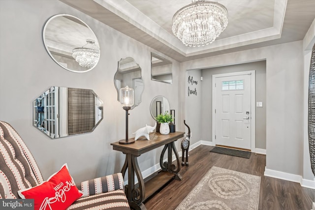 294 Letitia Manor Dr, West Grove, PA 19390 - foyer entrance with a chandelier, wood finished floors, and a tray ceiling