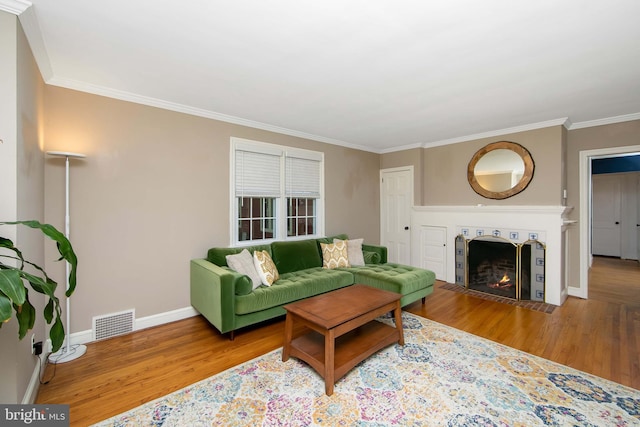 14 Utah Ave, Cherry Hill, NJ 08002 - living area with wood finished floors, crown molding, and a fireplace with flush hearth