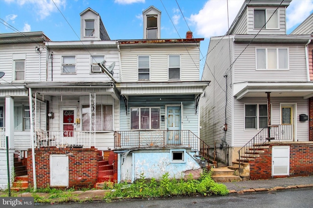 425 W Coal St, Shenandoah, PA 17976 - townhome / multi-family property with stairway and a porch