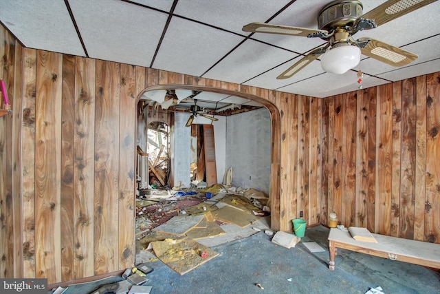 425 W Coal St, Shenandoah, PA 17976 - empty room with arched walkways, wood walls, and ceiling fan