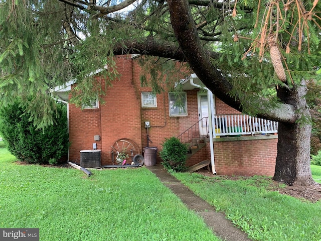 2142 Flag Marsh Rd, Mount Airy, MD 21771 - view of home's exterior with a lawn and brick siding
