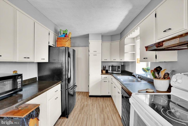 1124 Fairview Dr, Reading, PA 19605 - kitchen featuring black appliances, light wood-style floors, open shelves, white cabinetry, and a textured ceiling