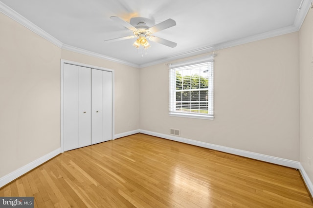 1516 Berwick Rd, Baltimore, MD 21204 - unfurnished bedroom with light wood finished floors, a closet, ornamental molding, and a ceiling fan