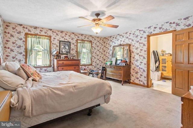 148 S Allwood Dr, Hanover, PA 17331 - carpeted bedroom with wallpapered walls and ceiling fan