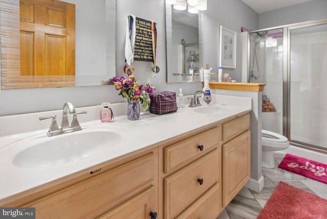 148 S Allwood Dr, Hanover, PA 17331 - bathroom with a shower stall, double vanity, and tile patterned flooring
