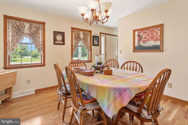 148 S Allwood Dr, Hanover, PA 17331 - dining room with a chandelier and light wood-style flooring