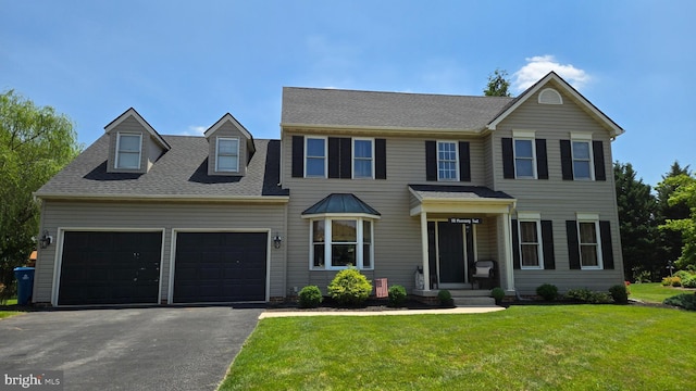 510 Monocacy Trl, Spring Grove, PA 17362 - view of front facade featuring driveway, a front yard, an attached garage, and roof with shingles