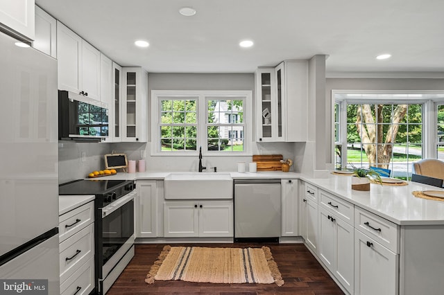 320 Redwood Grove Ct, Millersville, MD 21108 - kitchen with appliances with stainless steel finishes, a peninsula, white cabinets, healthy amount of natural light, and recessed lighting