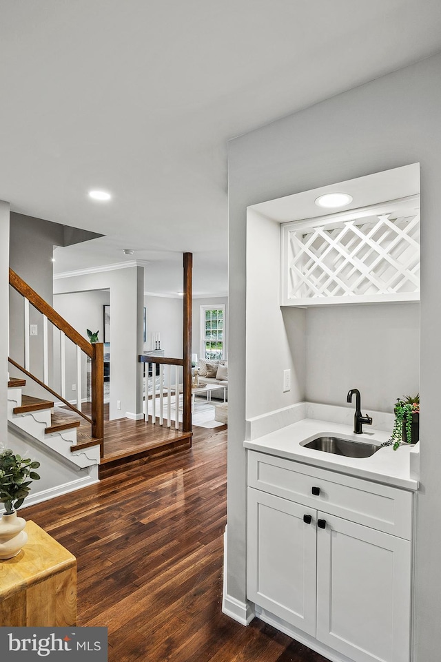320 Redwood Grove Ct, Millersville, MD 21108 - indoor wet bar featuring dark wood-type flooring, stairs, and recessed lighting