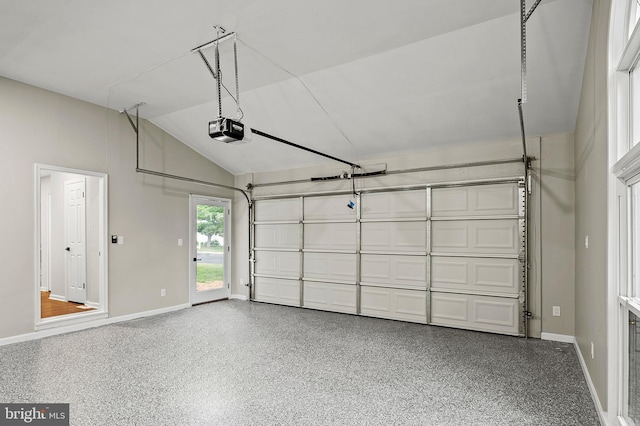 320 Redwood Grove Ct, Millersville, MD 21108 - garage featuring a garage door opener and baseboards