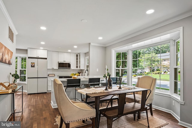 320 Redwood Grove Ct, Millersville, MD 21108 - dining space with crown molding, healthy amount of natural light, dark wood-style flooring, and recessed lighting