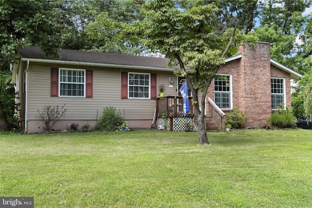 251 Kelly Dr, Harpers Ferry, WV 25425 - view of front of home with a front yard and a chimney