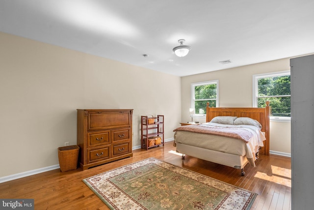 15321 Peach Orchard Rd, Silver Spring, MD 20905 - bedroom featuring wood finished floors