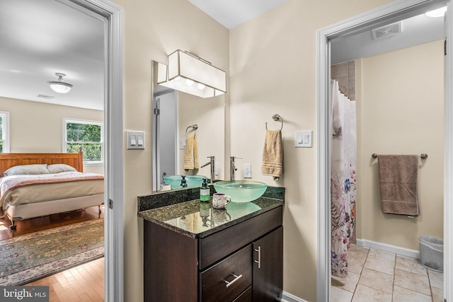 15321 Peach Orchard Rd, Silver Spring, MD 20905 - ensuite bathroom with vanity and curtained shower