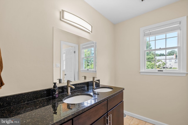 15321 Peach Orchard Rd, Silver Spring, MD 20905 - bathroom featuring double vanity and tile patterned flooring