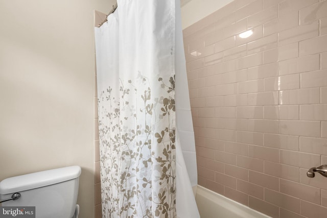 15321 Peach Orchard Rd, Silver Spring, MD 20905 - full bath featuring toilet and shower / bath combo with shower curtain