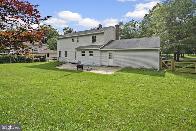 15321 Peach Orchard Rd, Silver Spring, MD 20905 - rear view of property with a patio area, a fenced backyard, and a chimney