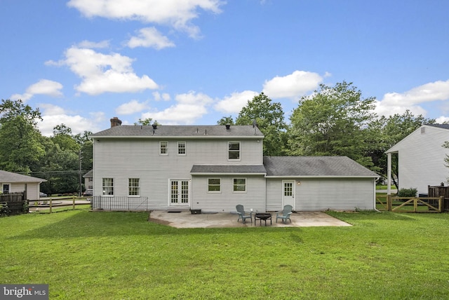15321 Peach Orchard Rd, Silver Spring, MD 20905 - back of property featuring a patio area, french doors, and a chimney