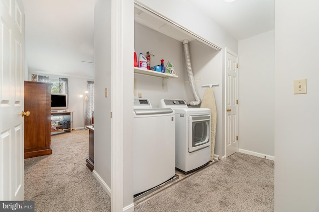 1866 Wexford Rd, Palmyra, PA 17078 - laundry area with washer and clothes dryer and light colored carpet