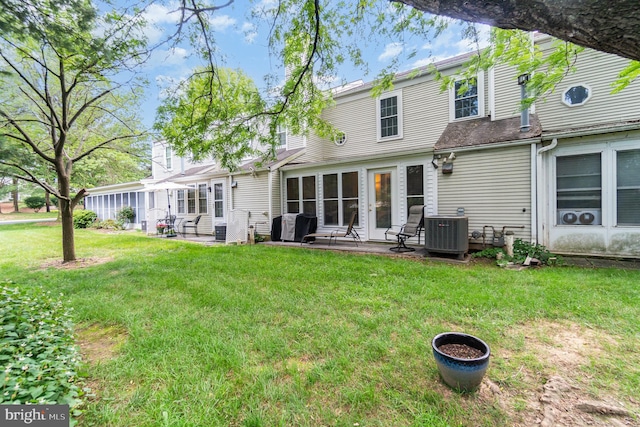 1866 Wexford Rd, Palmyra, PA 17078 - back of house with a patio and a lawn