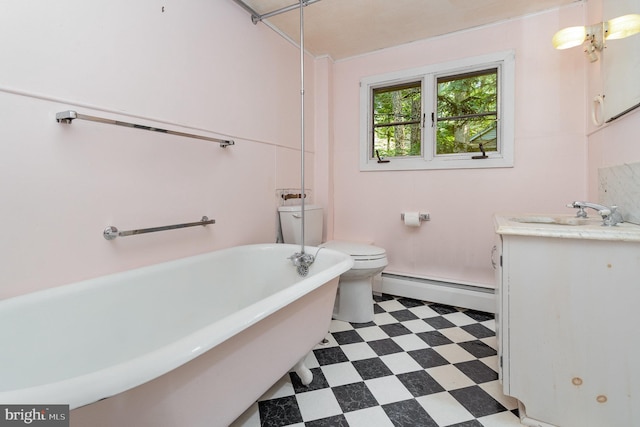 505 7th St, Mount Gretna, PA 17064 - full bath with tile patterned floors, baseboard heating, a soaking tub, and vanity