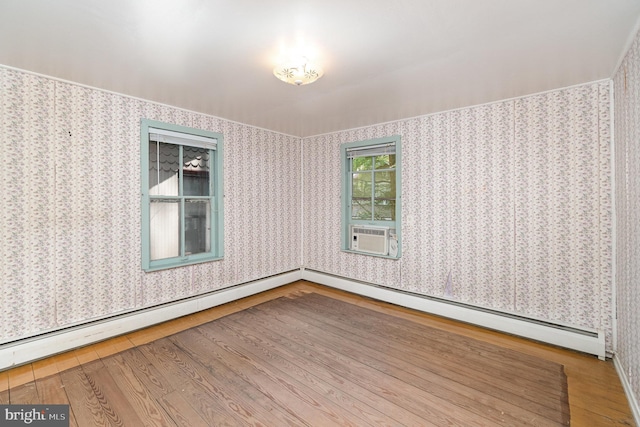 505 7th St, Mount Gretna, PA 17064 - spare room with wood finished floors, a baseboard radiator, and cooling unit