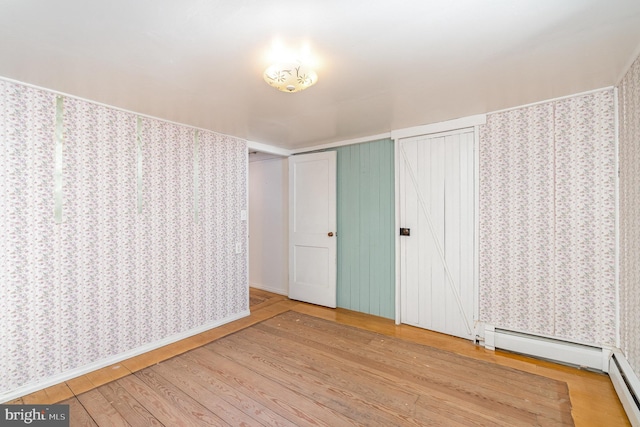 505 7th St, Mount Gretna, PA 17064 - unfurnished bedroom featuring wood finished floors and baseboard heating