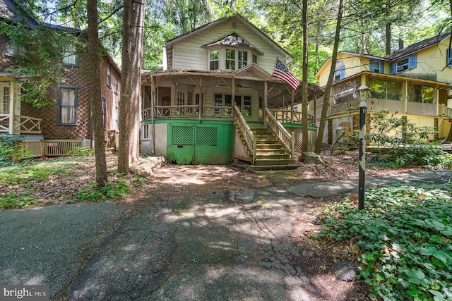 505 7th St, Mount Gretna, PA 17064 - rear view of property featuring stairway and a sunroom