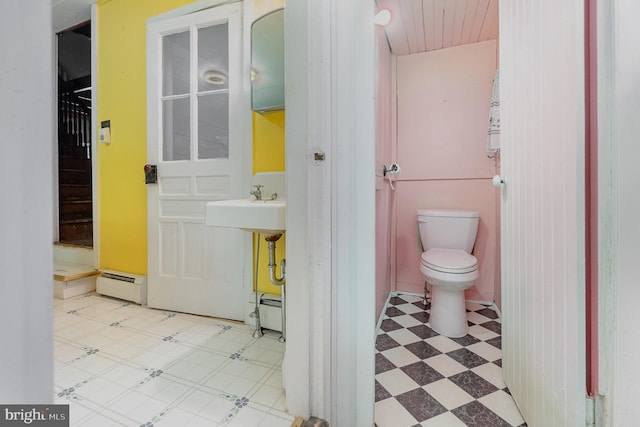 505 7th St, Mount Gretna, PA 17064 - bathroom featuring tile patterned floors, baseboard heating, and a baseboard heating unit