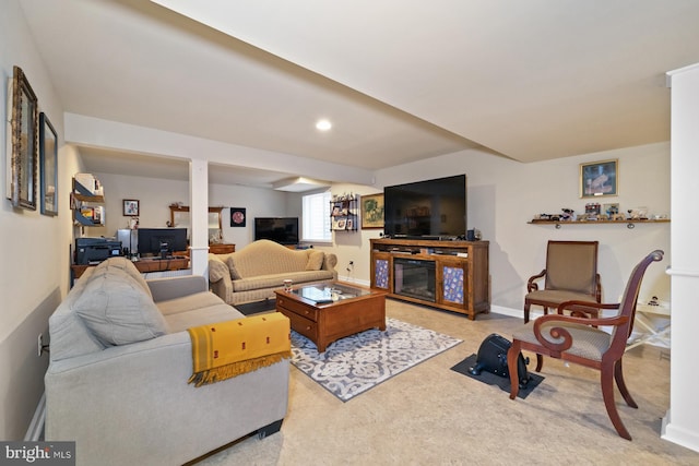 231 Lupine Dr, Smyrna, DE 19977 - living area with a glass covered fireplace, light carpet, and recessed lighting