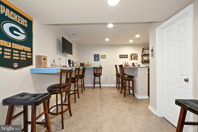 231 Lupine Dr, Smyrna, DE 19977 - indoor wet bar featuring recessed lighting and carpet flooring