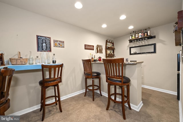 231 Lupine Dr, Smyrna, DE 19977 - indoor dry bar with recessed lighting and carpet floors