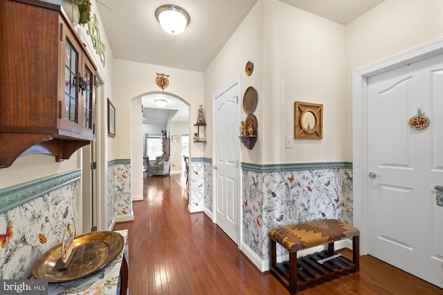 231 Lupine Dr, Smyrna, DE 19977 - entrance foyer with wainscoting, arched walkways, and hardwood / wood-style flooring
