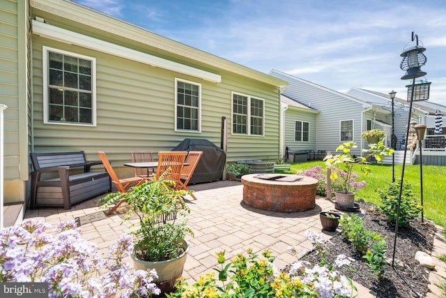 231 Lupine Dr, Smyrna, DE 19977 - view of patio featuring an outdoor fire pit and grilling area