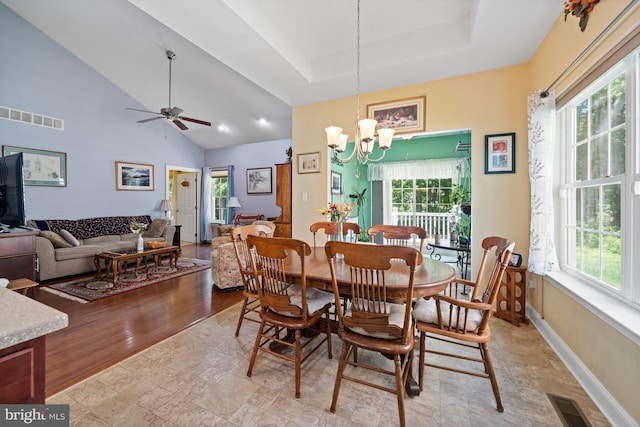 231 Lupine Dr, Smyrna, DE 19977 - dining area with healthy amount of natural light, a chandelier, ceiling fan, and vaulted ceiling