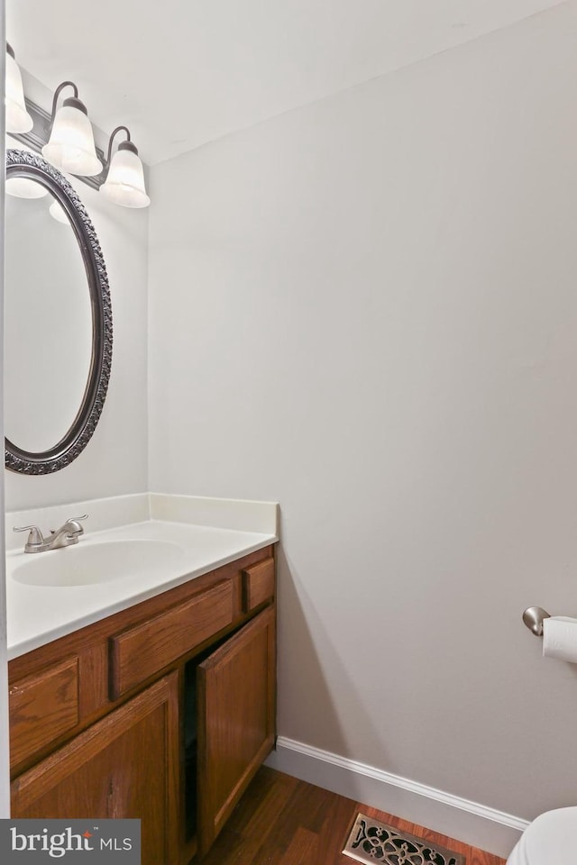 7547 Filbert Ter, Gaithersburg, MD 20879 - bathroom with vanity and wood finished floors