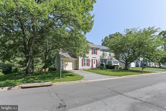 7547 Filbert Ter, Gaithersburg, MD 20879 - view of front of house with a garage, driveway, and a front lawn