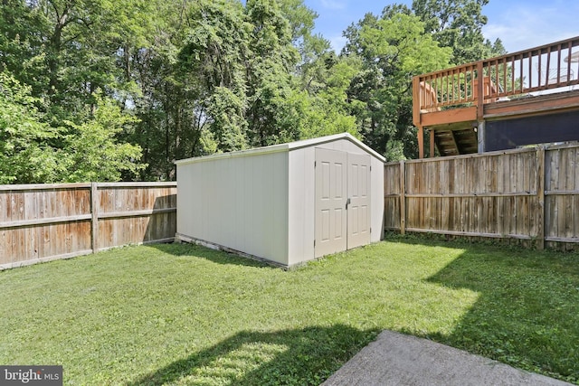 7547 Filbert Ter, Gaithersburg, MD 20879 - fenced backyard with a storage unit and a deck