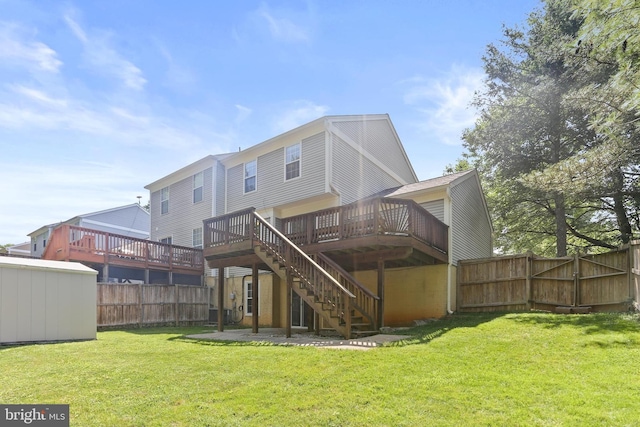 7547 Filbert Ter, Gaithersburg, MD 20879 - rear view of house featuring a wooden deck, stairway, and a shed