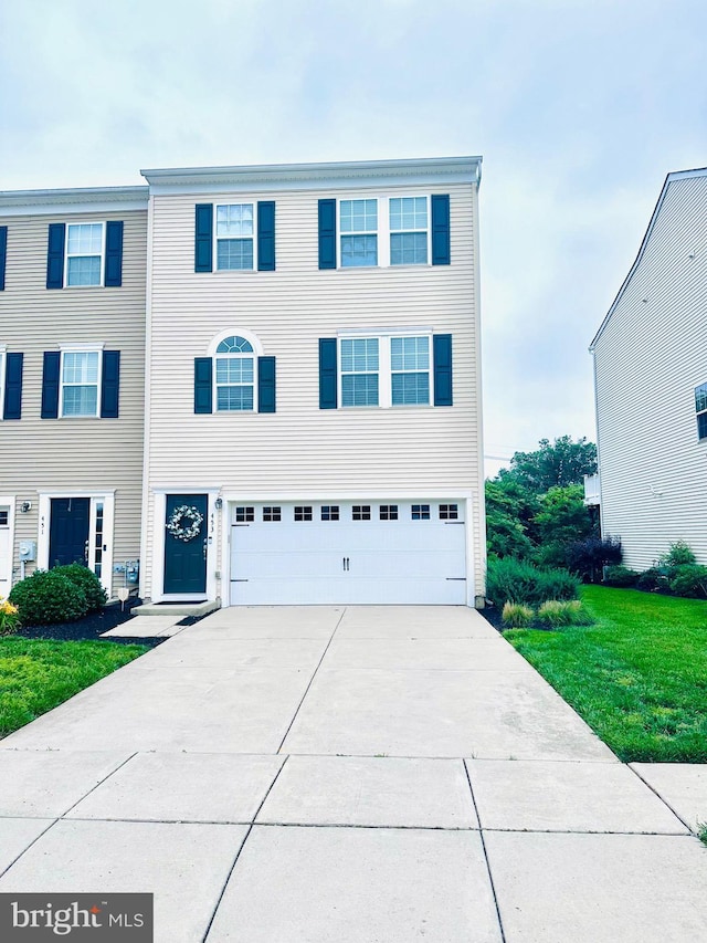 453 Dogwood Dr, Deptford, NJ 08096 - view of front of home with driveway, an attached garage, and a front lawn