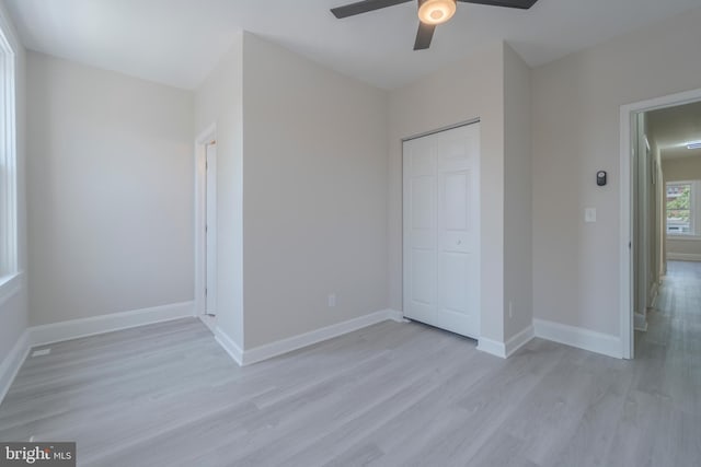 3335 Dudley Ave, Baltimore, MD 21213 - unfurnished bedroom featuring light wood-type flooring, a closet, and ceiling fan