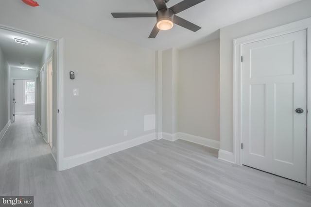 3335 Dudley Ave, Baltimore, MD 21213 - unfurnished bedroom featuring light wood finished floors and ceiling fan