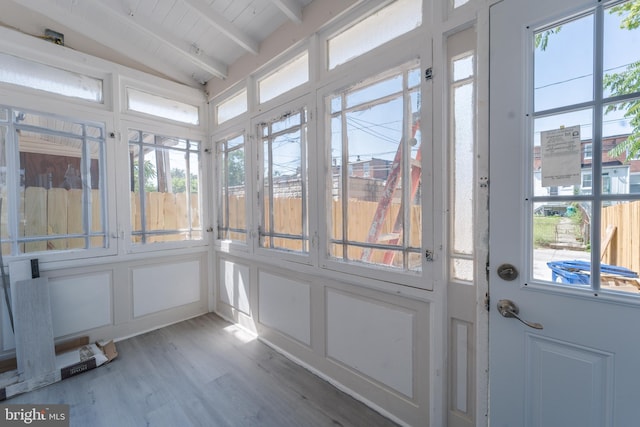 3335 Dudley Ave, Baltimore, MD 21213 - unfurnished sunroom featuring wood finished floors and beam ceiling
