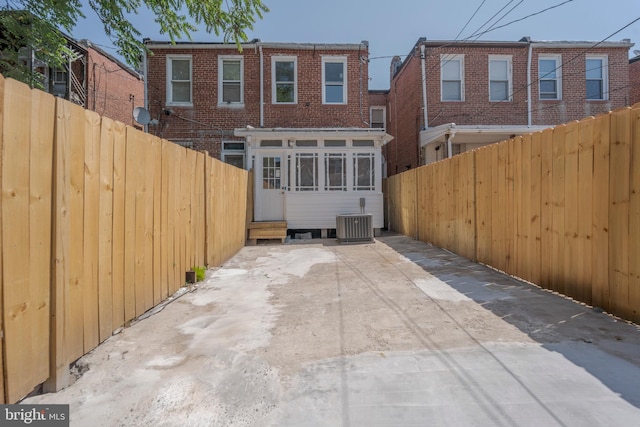 3335 Dudley Ave, Baltimore, MD 21213 - rear view of house featuring brick siding