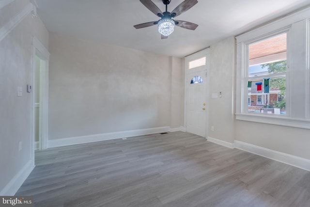 3335 Dudley Ave, Baltimore, MD 21213 - foyer with wood finished floors and ceiling fan